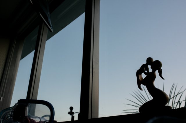 Family Holding Newborn Brazil Passport Documents